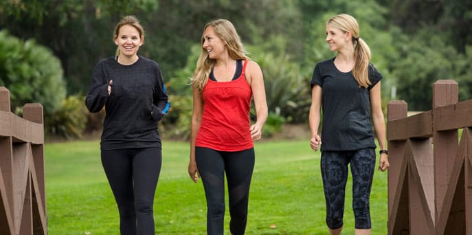 women exercising outdoors
