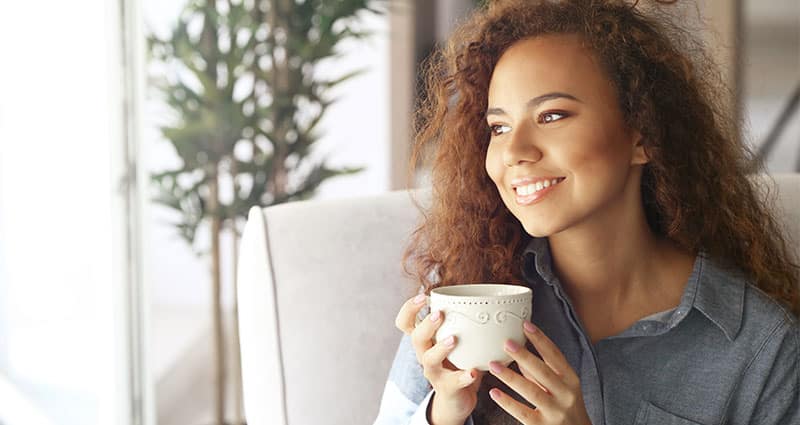 happy woman drinking tea