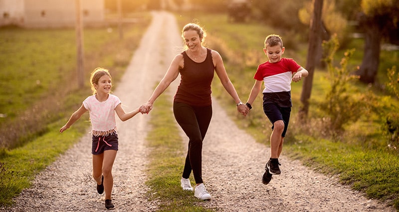 mom and kids frolicking