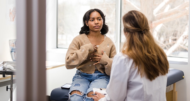 provider speaking with teenage girl