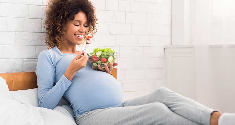 pregnant woman eating