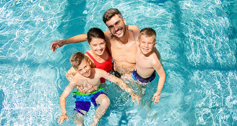 family in pool