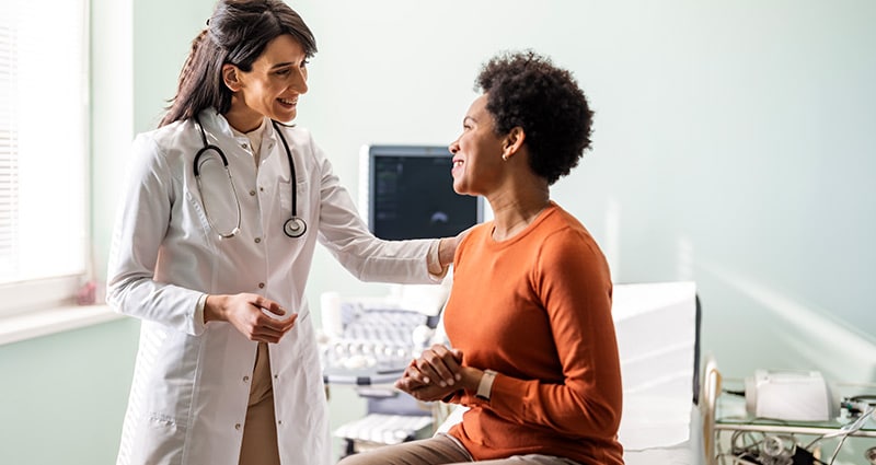 woman listening to her doctor