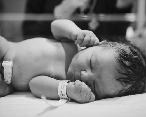 black and white image of newborn