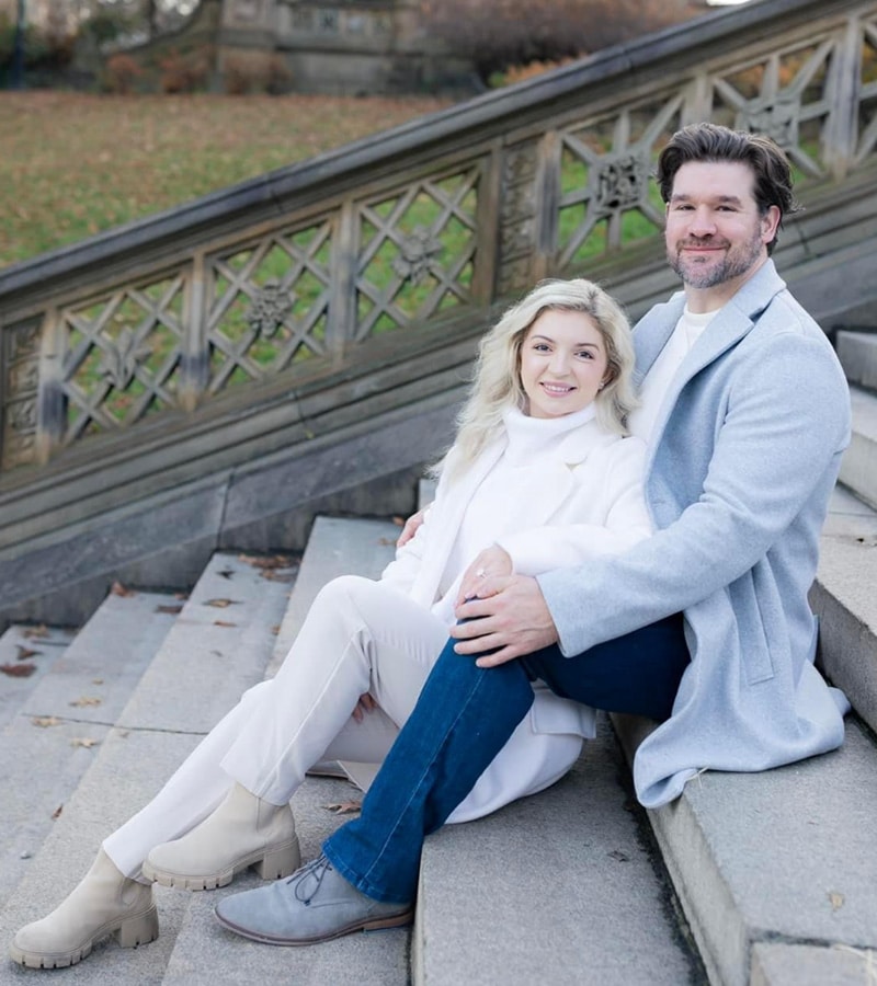 Taylor and Todd Knight sitting on steps