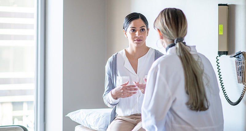 Woman talking to her doctor