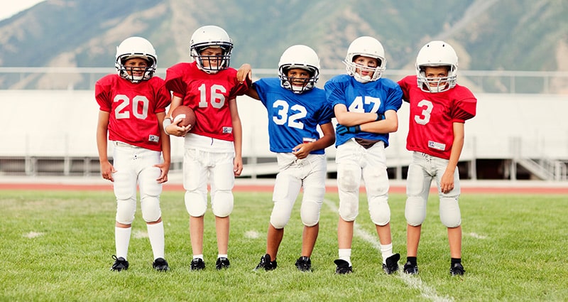 young football players in uniform